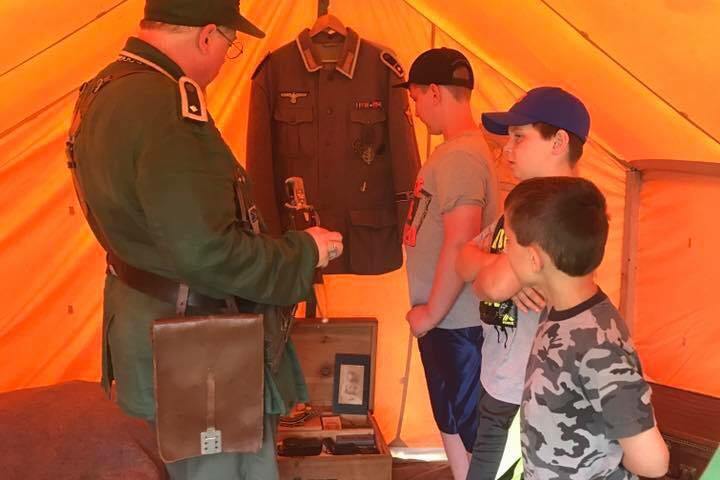 a group of people standing in a room