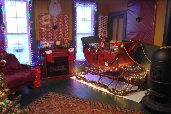 a living room with a christmas tree