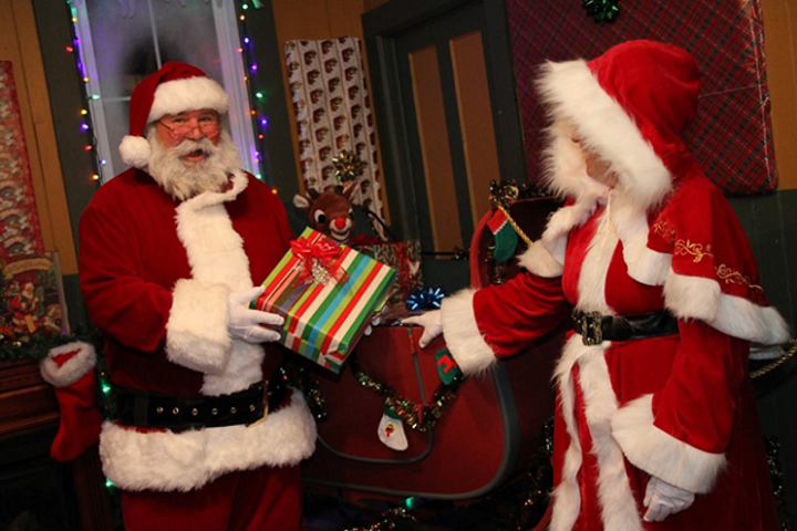 a little girl holding a teddy bear