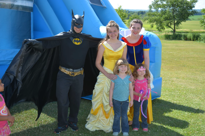 a person and a little girl posing for a picture