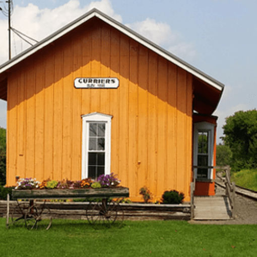 a bench in front of a house