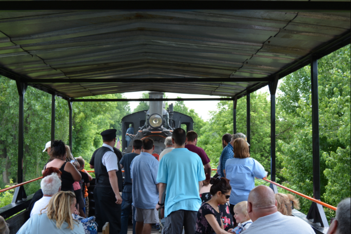 a group of people around each other