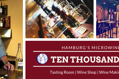 a person holding a wine glass