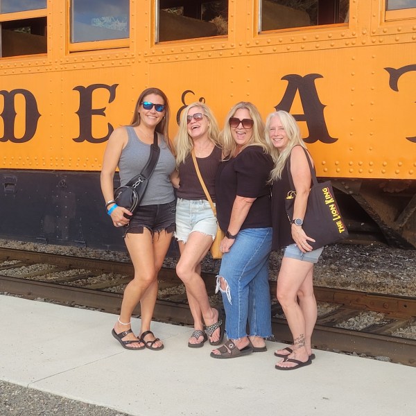 a group of people posing for the camera