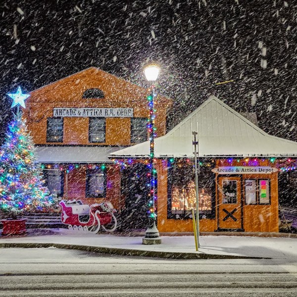 a sign in front of a building